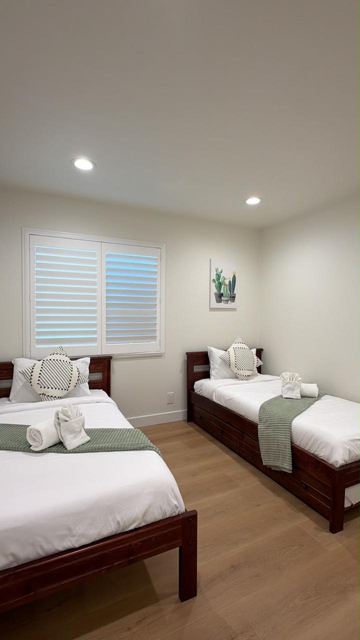 Guest bedroom prepared with fresh linens for vacation home cleaning